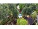 Aerial view of a private backyard featuring pool and wooded areas at 132 Wheatsbury Dr, Cary, NC 27513