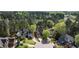 Aerial view of charming homes nestled among mature trees in a quiet neighborhood at 132 Wheatsbury Dr, Cary, NC 27513