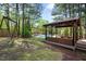 Backyard featuring a covered patio, outdoor seating, swing set, and swimming pool at 132 Wheatsbury Dr, Cary, NC 27513
