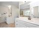 Elegant bathroom with dual sinks, quartz countertops, and modern fixtures at 132 Wheatsbury Dr, Cary, NC 27513