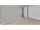 Bedroom with gray walls, carpeted floor, and a closet at 1323 Fairmont St, Durham, NC 27713