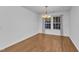 Cozy dining room boasts natural light and hardwood floors, a perfect space for Gathering meals at 1323 Fairmont St, Durham, NC 27713