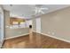 Bright open floorplan features a kitchen with dining bar, with living room and fireplace in view at 1323 Fairmont St, Durham, NC 27713