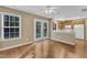 Dining area leads to kitchen, has wood floors, and a French door to the outside at 1323 Fairmont St, Durham, NC 27713