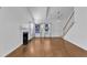 Bright living room with hardwood floors, a fireplace, and ample natural light at 1323 Fairmont St, Durham, NC 27713