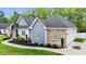 Charming single-story home with brick, siding, and a well-manicured lawn at 1325 George Bason Rd, Graham, NC 27253