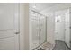 Bathroom featuring a glass-enclosed shower and modern fixtures at 135 Carlton Ln, Franklinton, NC 27525