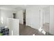 Upstairs hallway featuring hard wood floors with doors leading to other rooms at 135 Carlton Ln, Franklinton, NC 27525