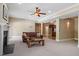 Large basement living room features a fireplace and a wet bar on the far side of the room at 1422 Gormly Cir, Sanford, NC 27330