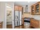Kitchen with stainless steel refrigerator, gas stovetop, and cabinet space at 1422 Gormly Cir, Sanford, NC 27330
