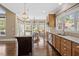 Open concept kitchen and dining area with stainless steel appliances at 1422 Gormly Cir, Sanford, NC 27330