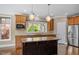 Kitchen with granite countertops, kitchen island, and stainless steel appliances at 1422 Gormly Cir, Sanford, NC 27330
