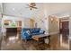 Spacious living room with hardwood floors, open layout, and view of the kitchen and entry at 1422 Gormly Cir, Sanford, NC 27330