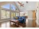 Bright living room featuring hardwood floors, high ceilings, and scenic outdoor views at 1422 Gormly Cir, Sanford, NC 27330