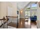 Elegant living room with hardwood floors, vaulted ceilings, and expansive windows with natural light at 1422 Gormly Cir, Sanford, NC 27330