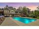 Outdoor living at its finest with a large swimming pool and picturesque backyard setting at 1422 Gormly Cir, Sanford, NC 27330