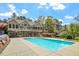 Backyard boasts a pristine pool, perfect for relaxation and entertainment at 1422 Gormly Cir, Sanford, NC 27330