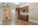 Entertainers will love this wet bar with plenty of cabinet space, a sink, and beautiful tiled floors at 1422 Gormly Cir, Sanford, NC 27330