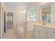 Bright bathroom with double vanities, soaking tub and access to the walk-in shower at 1537 Heritage Club Ave, Wake Forest, NC 27587