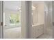 Hall bathroom with white vanity, tile floors, and a shower-tub combination at 1537 Heritage Club Ave, Wake Forest, NC 27587