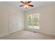 Bright bedroom with double closets and a large window, natural lighting at 1537 Heritage Club Ave, Wake Forest, NC 27587