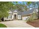 Well-maintained home with a long driveway and attached garage at 1537 Heritage Club Ave, Wake Forest, NC 27587