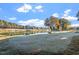 Scenic water view of the Heritage Wake Forest golf course and pond with trees at 1537 Heritage Club Ave, Wake Forest, NC 27587