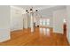 Spacious living room featuring hardwood floors, fireplace, and abundant natural light at 1537 Heritage Club Ave, Wake Forest, NC 27587