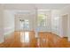 Spacious living room with hardwood floors, columns, and decorative trim at 1537 Heritage Club Ave, Wake Forest, NC 27587