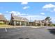 Well maintained parking lot in front of amenity buildings at 1537 Heritage Club Ave, Wake Forest, NC 27587