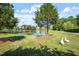 Charming pond featuring a wooden bridge and gazebo, ideal for peaceful moments at 1537 Heritage Club Ave, Wake Forest, NC 27587