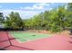 Well maintained tennis court surrounded by lush greenery at 1537 Heritage Club Ave, Wake Forest, NC 27587