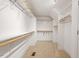 Spacious walk-in closet with custom shelving and ample storage space at 1537 Heritage Club Ave, Wake Forest, NC 27587