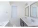 Bathroom with a double sink vanity, large mirrors, and ample lighting for a bright and functional space at 157 Durants Neck Ln, Morrisville, NC 27560