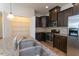View of the kitchen featuring stainless steel appliances, granite counter tops, and a large pantry at 157 Durants Neck Ln, Morrisville, NC 27560