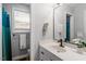 Bathroom featuring vanity and a window at 1752 Cobblestone Dr, Creedmoor, NC 27522