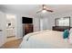 Bedroom featuring a ceiling fan, carpet, bed and access to an ensuite bathroom at 1752 Cobblestone Dr, Creedmoor, NC 27522