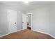 Bedroom with neutral carpet and two closets at 1752 Cobblestone Dr, Creedmoor, NC 27522
