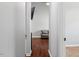 Hallway with views to living room and bedroom at 1752 Cobblestone Dr, Creedmoor, NC 27522