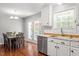 Bright eat-in kitchen with stainless steel appliances and a view of the backyard at 1752 Cobblestone Dr, Creedmoor, NC 27522