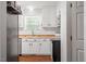 Bright kitchen boasts white cabinetry, wood countertops, and modern stainless steel appliances at 1752 Cobblestone Dr, Creedmoor, NC 27522