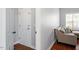 Entryway view of a cozy living room area with a comfortable sectional sofa at 1752 Cobblestone Dr, Creedmoor, NC 27522