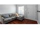 Inviting living room featuring a gray sectional sofa with stylish throw pillows at 1752 Cobblestone Dr, Creedmoor, NC 27522