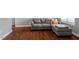 Comfortable living room with a sectional sofa and abundant natural light at 1752 Cobblestone Dr, Creedmoor, NC 27522