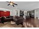 Open-concept living space seamlessly connects the living room with sectional sofa to the gourmet kitchen at 1840 Flint Valley Ln, Apex, NC 27502