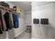 Spacious walk-in closet with multiple shelves and hanging space for optimal organization and storage solutions at 1840 Flint Valley Ln, Apex, NC 27502