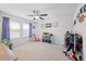 Bright bedroom with carpeted floors, fan, and plenty of natural light at 190 Bingham Creek Dr, Garner, NC 27529