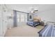 Bright, cheerful bedroom with carpeted floors and plenty of natural light at 190 Bingham Creek Dr, Garner, NC 27529