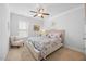 Bright bedroom with a neutral color palette, plush carpet, and decorative bedding at 190 Bingham Creek Dr, Garner, NC 27529