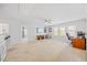Large bonus room with a ceiling fan, natural light, and neutral carpet at 190 Bingham Creek Dr, Garner, NC 27529